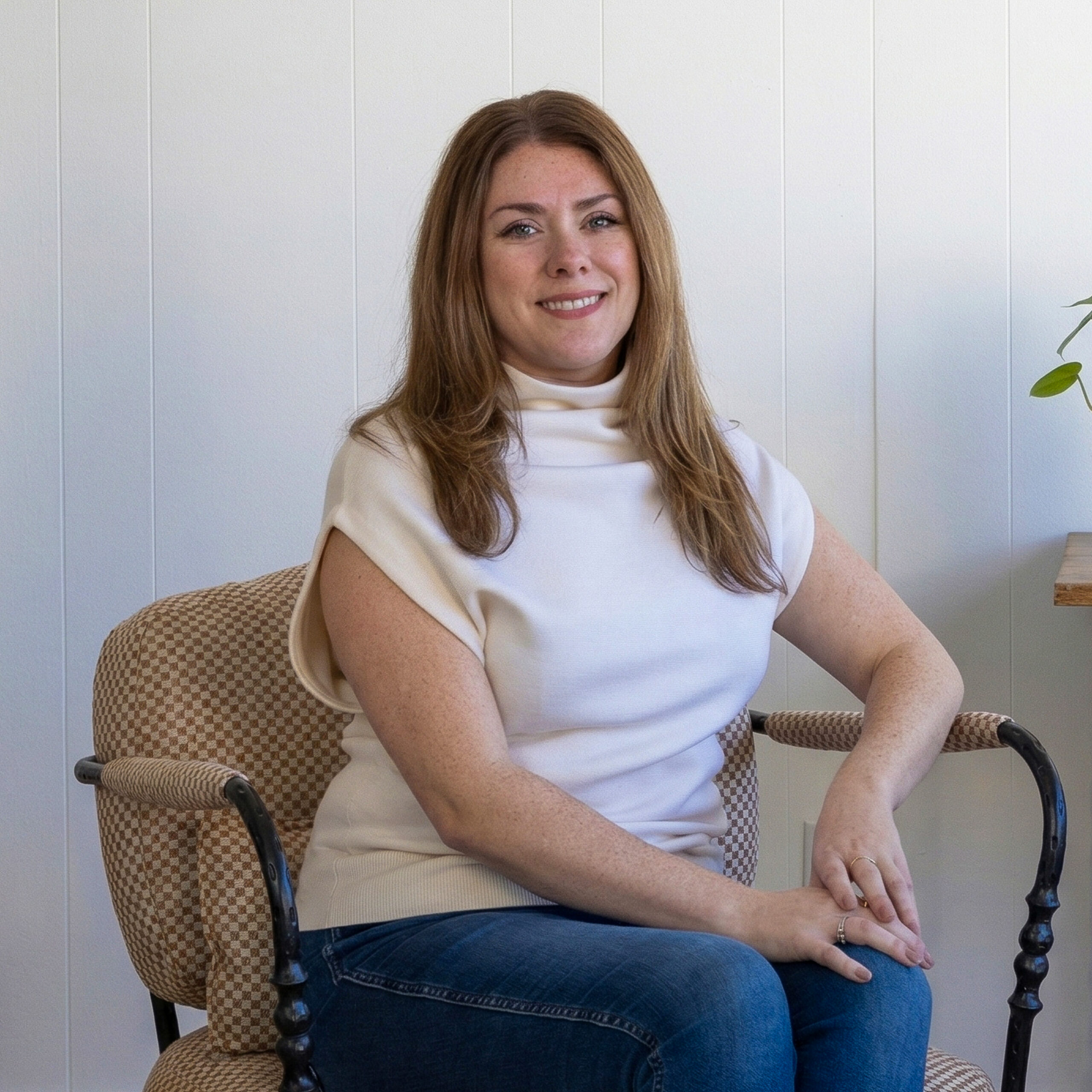 Portrait of Chloe Darché Maggs at South Harlow Interiors showroom.