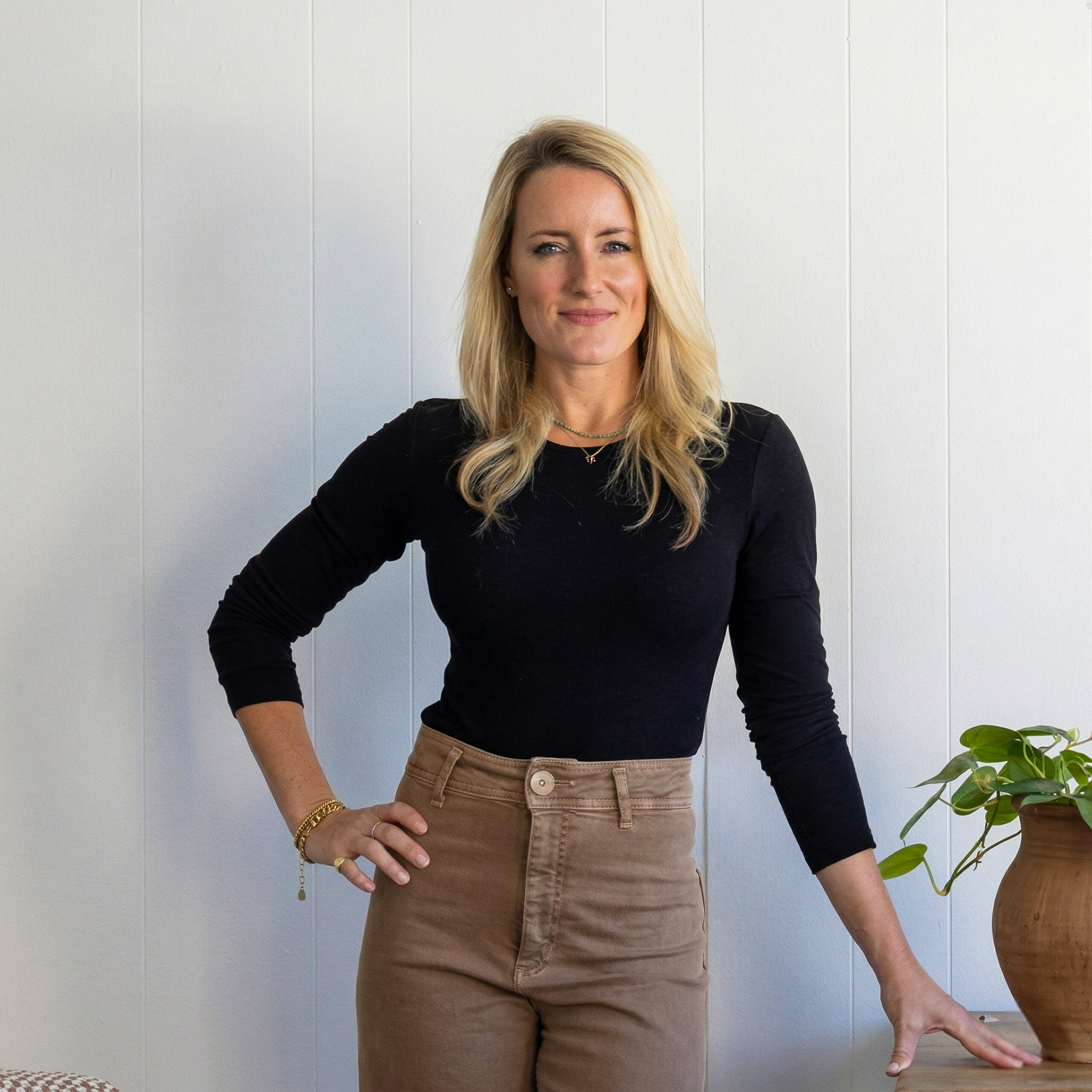 Portrait of Chloe Darché Maggs in stylish interior setting, showcasing modern design and decor.