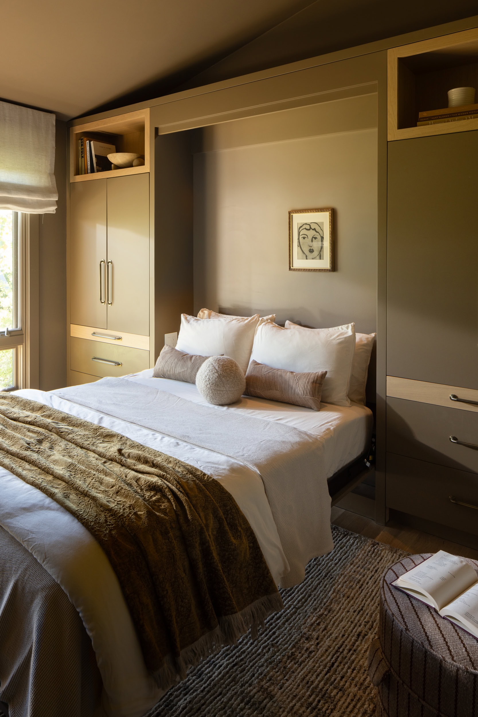 Modern bedroom with stylish furniture and cozy bedding for a relaxing atmosphere.