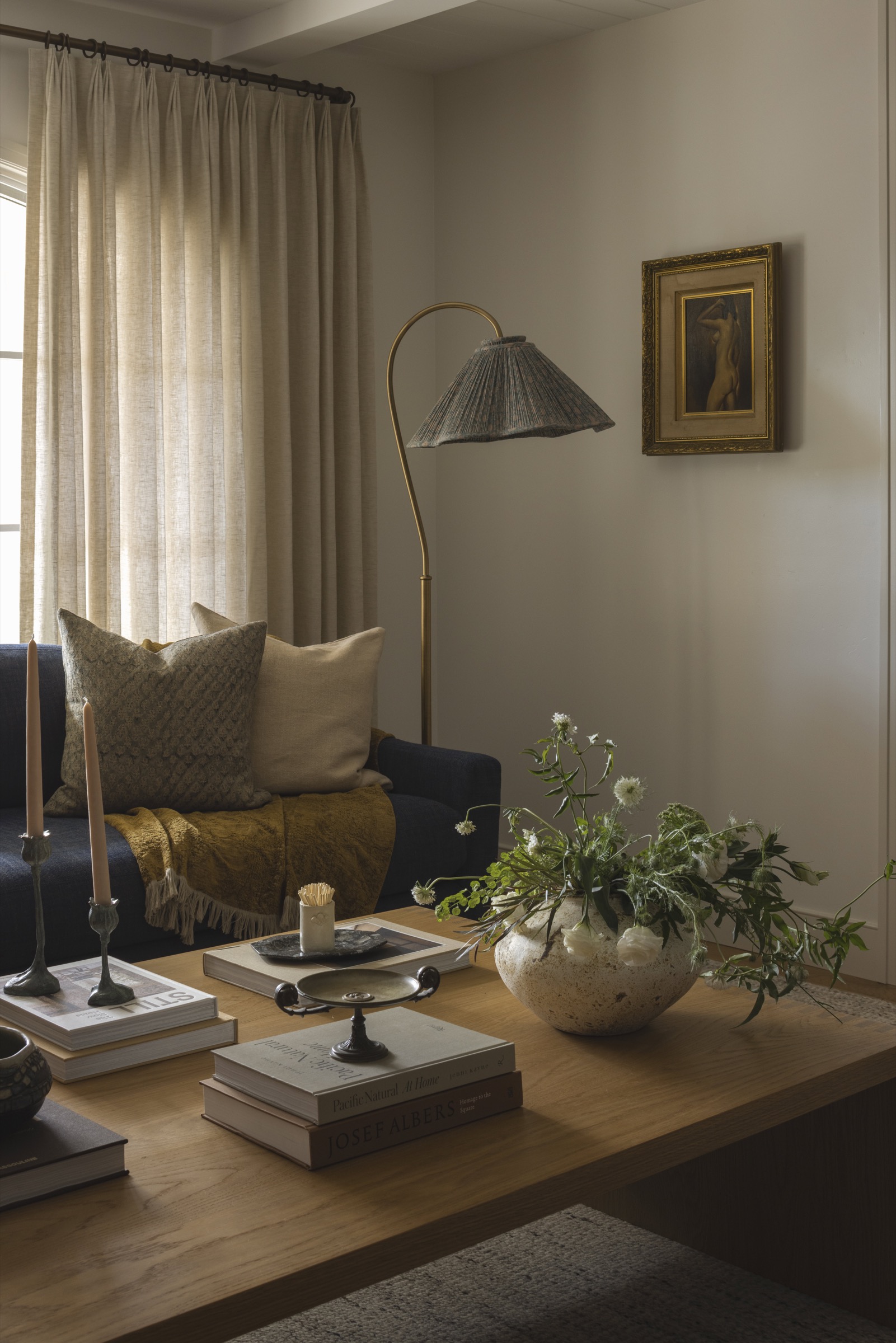 Elegant living room with cozy seating and stylish decor elements.